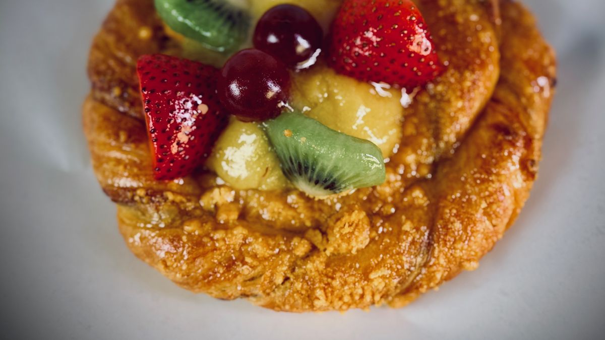 Fruit-topped Danish pastries with flaky crusts